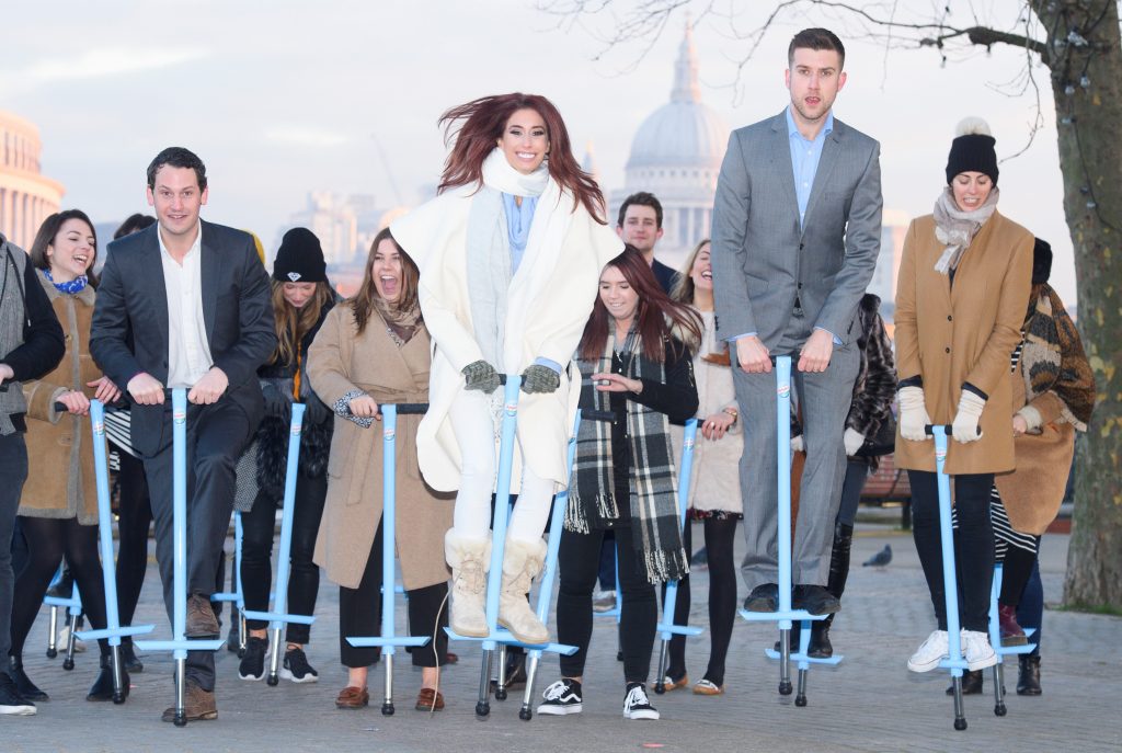 Stacey Solomon leads London commuters in a group pogo along London’s South Bank this morning 4